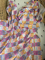 PASTEL CHARMS JERSEY SWADDLE MTM
